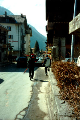 Kevin and Brendan walking down the street to the slopes